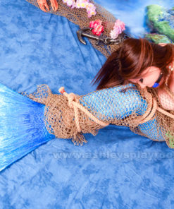 Mermaid Ashley captured in net